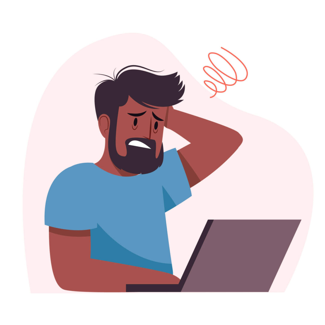 Worried man in front of laptop